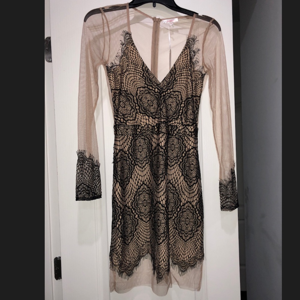 Black lace and nude dress